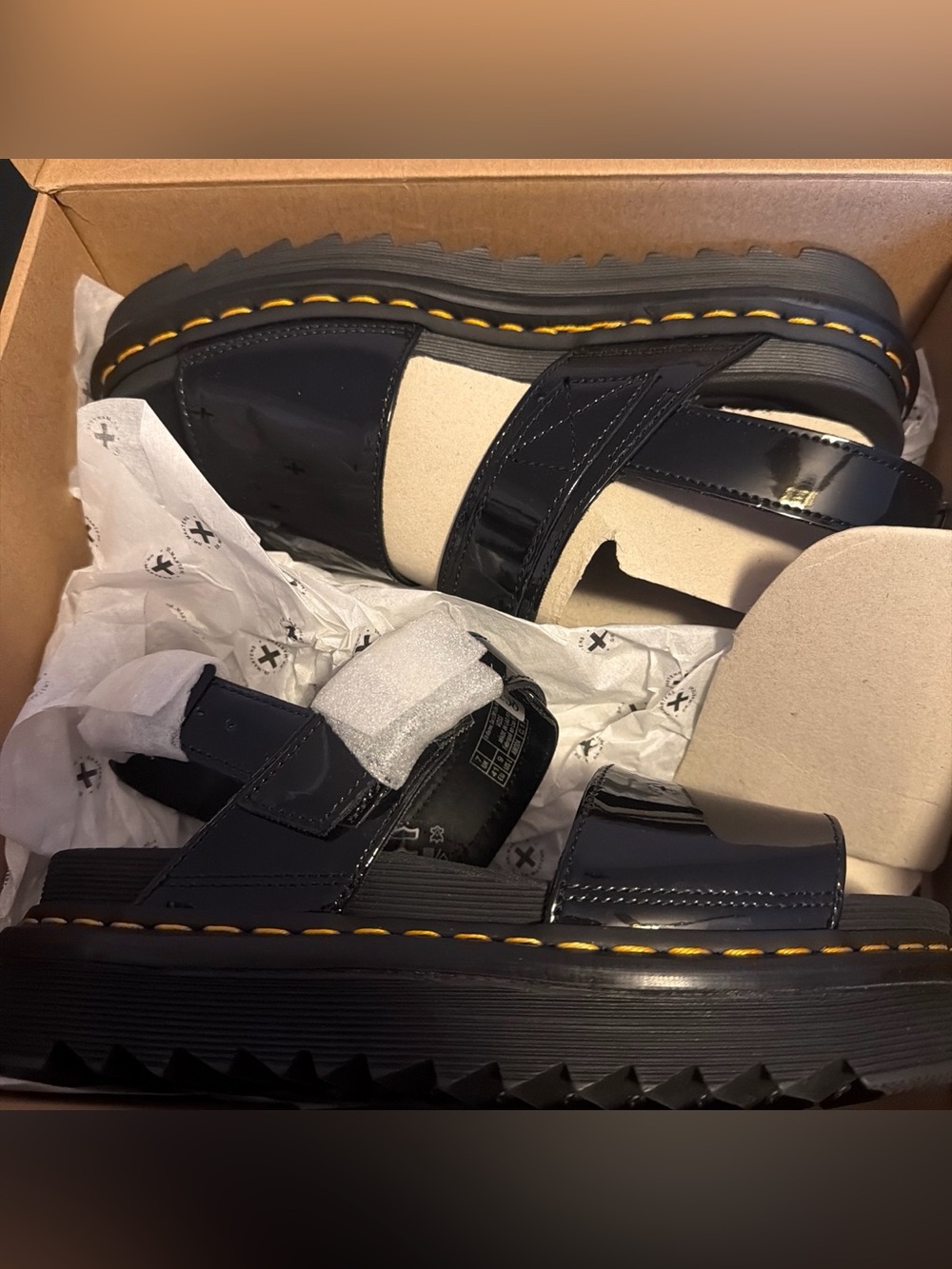 Dr. Martens black leather sandals with chunky sole